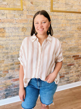 Woman wearing Mia Button Down T-Shirt – striped oversized cotton top