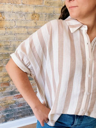Woman wearing Mia Button Down T-Shirt – striped oversized cotton top