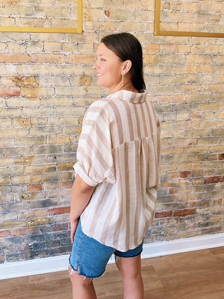 Woman wearing Mia Button Down T-Shirt – striped oversized cotton top