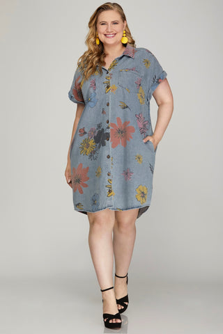 Plus size woman wearing floral denim shirt dress with pockets – summer outfit from Brightter Boutique