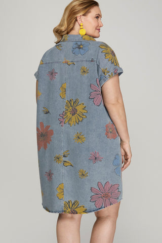 Plus size woman wearing floral denim shirt dress with pockets – summer outfit from Brightter Boutique.