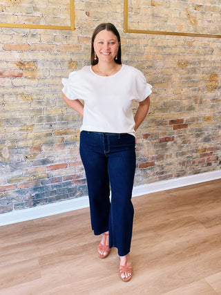 Everly Blouse – textured short sleeve top with elastic details on sleeves and flowy cut on the waist.